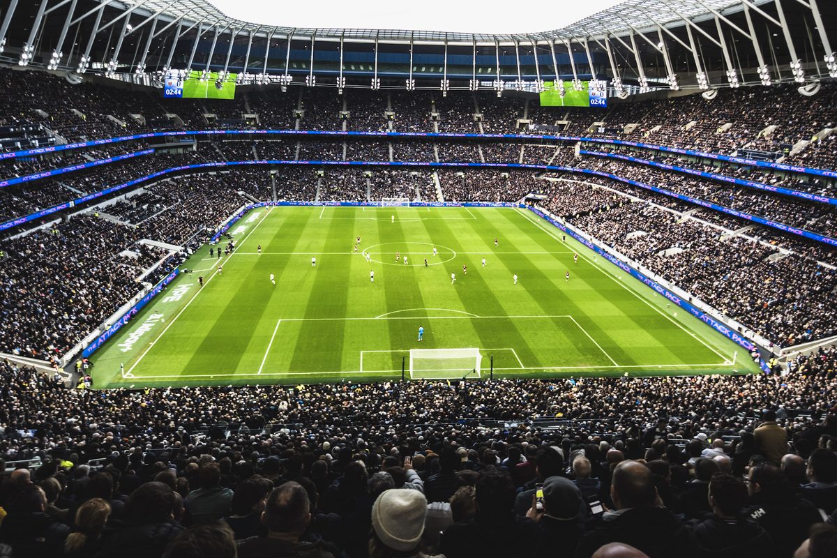 The view from the upper stand at Tottenham Hotspur Stadium with the match under way and the ground full.